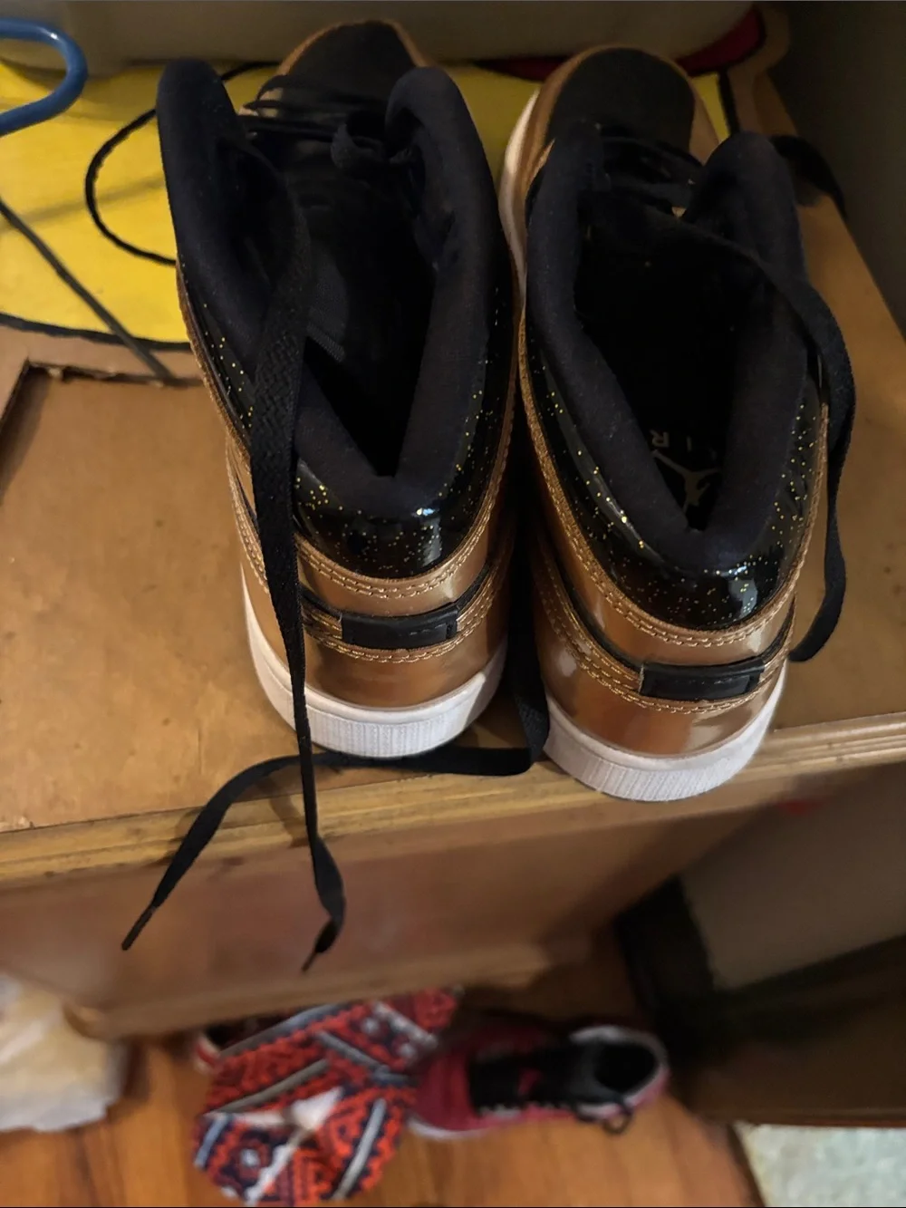 Nike Men’s Black and Gold High-Top Sneakers